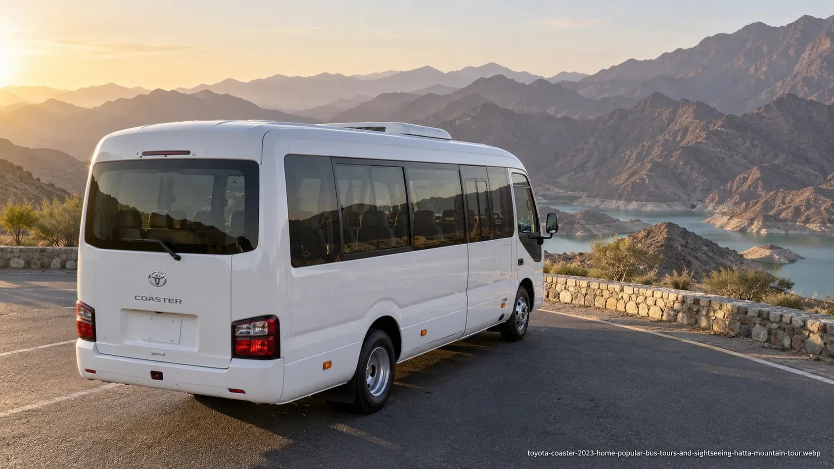 Minibus on a mountain road illustrating Dubai ↔ Hatta Private Bus & Van Transfer